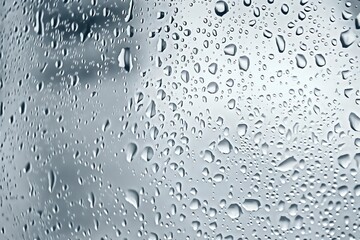 Canvas Print - dew water droplets on glass: a close-up photograph capturing the beauty of condensation, with sparkl
