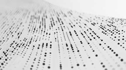 Leinwandbilder - A close-up shot of a white surface with a pattern of black dots arranged in a wave-like formation, creating an abstract design.