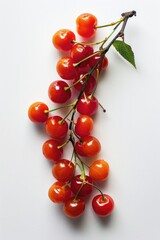 Sticker - A plate of cherries arranged neatly on a white surface, perfect for photography or illustration