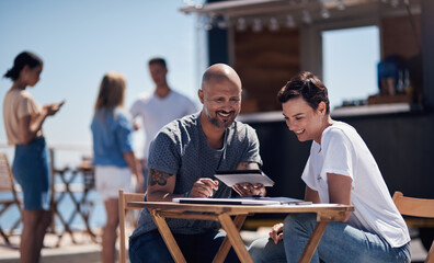 Poster - Colleagues, tablet and reading with smile, outdoor and review of statement for small business in summer. Partner, man and check for bills of store, paperwork and working on table and food truck