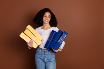 Poster - Photo of pretty young girl folders look empty space wear pullover isolated on brown color background