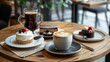 © Adi - A stylish café setting with a beautifully arranged table featuring creamy coffee and an assortment of gourmet desserts
