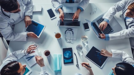 Wall Mural - Medical co working concept,Doctor working with smart phone and digital tablet and laptop computer to meeting his team in modern office at hospital