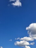 Fototapeta Niebo - Clouds in the blue sky.