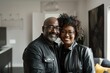 © CogniLens - Portrait of a blissful multicultural couple in their 40s sporting a classic leather jacket in front of crisp minimalistic living room