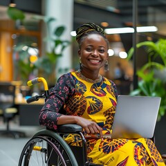 Wall Mural - A woman in a wheelchair with a laptop.