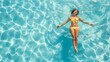 © Damerfie - A woman wearing a bright yellow bikini lazily floats on the surface of a pool, basking in the sunlight with her arms extended and eyes closed, radiating pure relaxation.