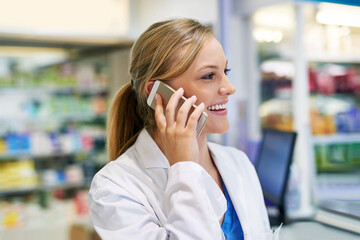 Wall Mural - Woman, pharmacy and phone call with discussion for medical job or healthcare, communication for medicine or stock. Female pharmacist, drug store and working with mobile for telehealth or advice