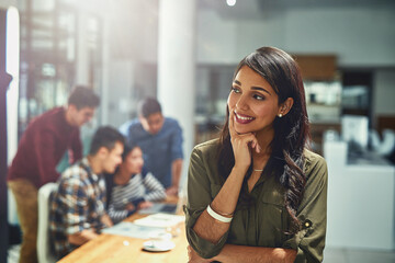 Poster - Teamwork, smile and thinking business woman at desk in office for creative startup company. Face, happy manager and technology for graphic designer, entrepreneur or worker coworking in meeting