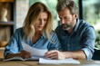 © ArtCraft - Concerned couple reviewing legal documents. Perfect for illustrating divorce discussions with a divorce lawyer, legal consultations, and online articles related to divorce and family law.