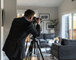 © modestil - Real Estate Photographers taking an interior photograph inside a modern clean house