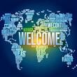 © Tekin - Concept or conceptual abstract welcome or greeting international word cloud in hand, different languages or multilingual, metaphor to world, foreign, worldwide, travel, translate, vacation or tourism