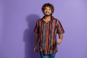 Sticker - Photo of pleasant good mood latin man with wavy hairdo dressed print shirt go shopping on sale isolated on purple color background