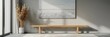 © Ilia Nesolenyi - A sleek wooden bench sits in a modern living room with a grey blank canvas