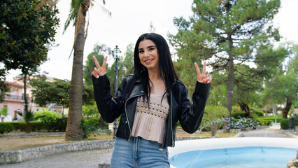 Happy Pose For A Woman Near A Fountain 