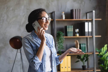 Wall Mural - Photo of attractive corporate agent girl speak telephone loft interior business center office indoors