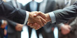 © Creative-Touch - close up of business people shaking hands