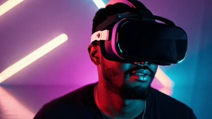 Aufkleber - A man with short black hair wears a virtual reality headset in front of a neon pink and blue background.