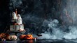 © Palung - Halloween party cake Cookies screaming ghost on the table decorated with cream, pumpkins, candles, smoke spooky scary trick or treats October 31 copy space blank background