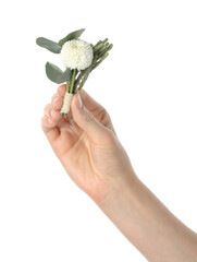 Wall Mural - Woman holding stylish boutonniere on white background, closeup