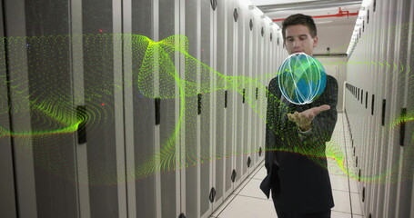 Image of yellow network wave over caucasian businessman with global network in server room