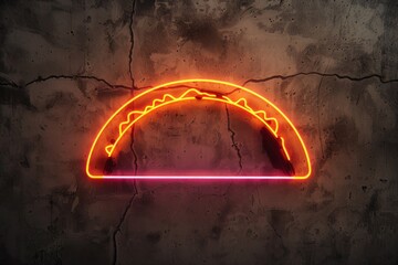 Illuminated neon taco sign on a concrete wall