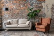 © Alona - Brick Wall Interior. Beautiful Living Room Apartment with Comfortable Armchair and Sofa