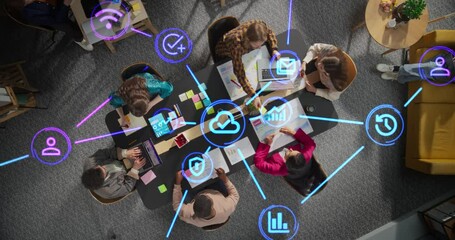 Leinwandbilder - Diverse Team Discussing Internet Software Tools, Online Services and Apps. Top Down Footage with Animated Holographic Icons Representing Cloud Storage, Privacy, Data Protection, Emailing, Reporting