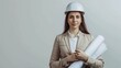 © MP Studio - The female architect with blueprints