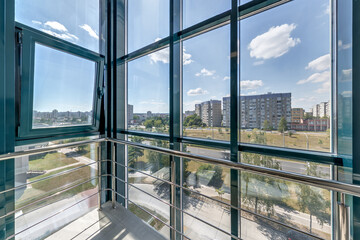 Sticker - panorama view in empty modern hall with columns, doors and panoramic windows