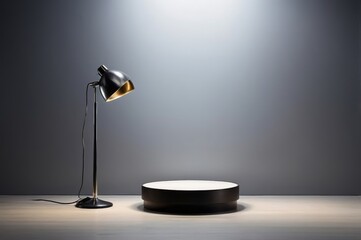 Poster - Black floor lamp and round pedestal on white floor