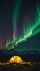 green aurora lights above a yellow tent, creating a stunning adventure travel scene