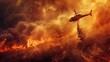 © Piyawat - A helicopter dropping water on a wildfire, with smoke and flames below