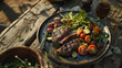 © Chatchanan - A rustic barbecue scene with a fork and knife resting beside a plate of grilled steak and vegetables, still life photography