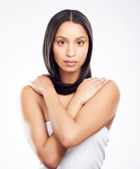 Poster - Portrait, hair care and woman with beauty, cosmetics and shine on white studio background. Face, person and model with volume, texture and dermatology with grooming routine, keratin treatment or glow