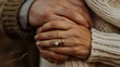 © julio - Close-up of Intertwined Hands with Engagement Ring