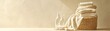 © BoOm - Spa-inspired scene with neatly folded towels in a woven basket and lotion bottles, set against a beige background for relaxation and calm.