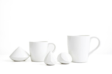 Poster - White ceramic mugs and geometric shapes on white background