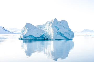 Canvas Print - Iceberg Floating in Calm Water