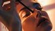 © VarunyuAi - Close-up of a woman's face with a makeup brush, artfully applying eyeshadow, highlighting her beauty and precision in a warm light.