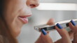 © stockbusters - Woman mouth talking smartphone speaker closeup. Girl recording voice message