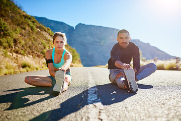 Wall Mural - Running, stretching and portrait of couple on road for workout, exercise and marathon training outdoors. Sports, dating and man and woman for cardio for health, fitness and wellness in morning