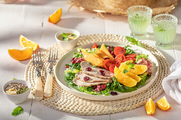 Wall Mural - Healthy and fresh salad made of fruits, meat and vegetables.