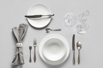 Wall Mural - Beautiful table setting with silver cutlery on white background