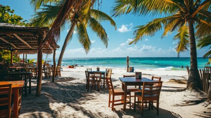 Wall Mural - chairs and tables on a paradise beach with palm trees on a sunny day