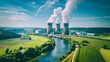 © practice  - Aerial perspective of a power plant with two cooling towers releasing steam, surrounded by green fields and waterways under clear blue skies.