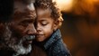 © svastix - In a heartfelt moment, an old man with weathered features embraces a young boy, capturing an emotional connection and warmth as the sun sets in the background.