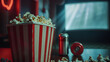 © CNISAK - a Movie Night Captured by a Blurred Hand Reaching for Popcorn in a Dimly Lit Theater Setting Creating a Sense of Excitement and Enjoyment