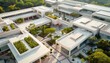 © HDP-STUDIO - Aerial view of a modern campus with lush greenery, sustainable architecture, and open courtyards, showcasing contemporary educational infrastructure.