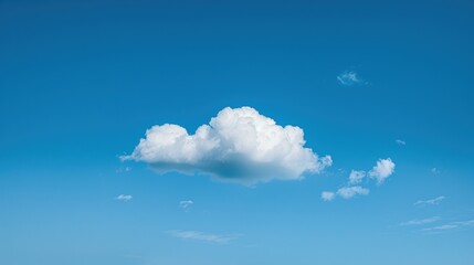 Poster - Fluffy white cloud in a clear blue sky